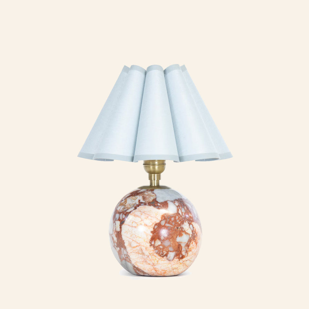13-inch Louise Red Marble Mini Table Lamp with blue scalloped shade by Kevin Francis Design, veined red marble base and brass hardware.