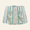 Blue and green printed pleated lamp shade by Kevin Francis Design with a stylish, textured fabric design.