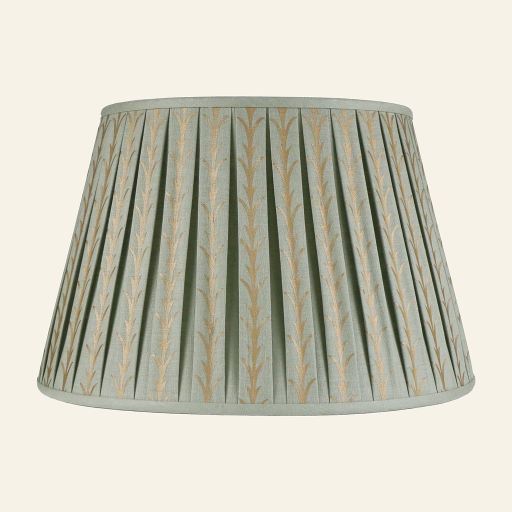Rosemary gold leaf pleated lamp shade by Kevin Francis Design, featuring elegant pleats and a sophisticated gold leaf finish.